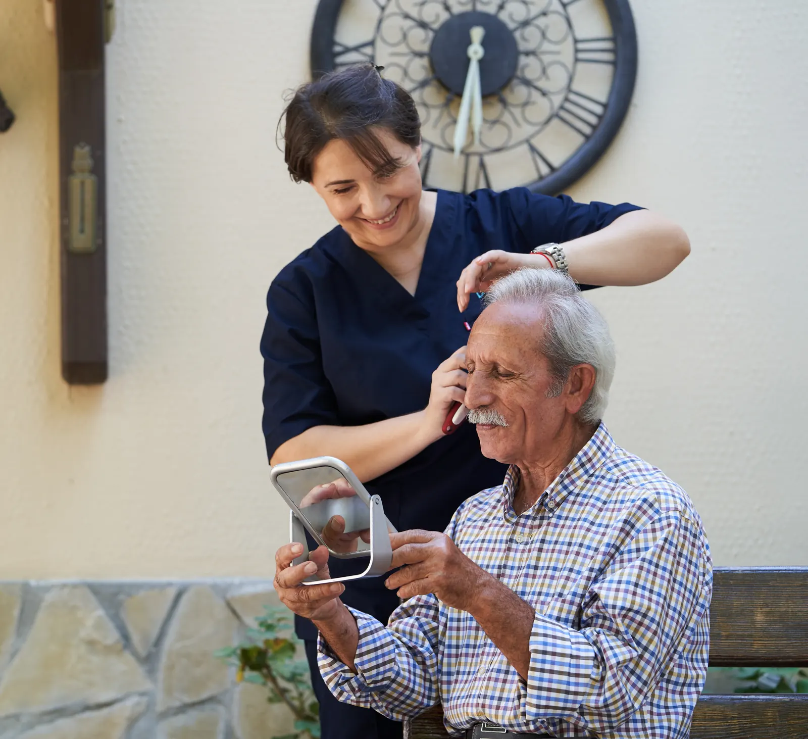 A professional carer supporting an older person at home